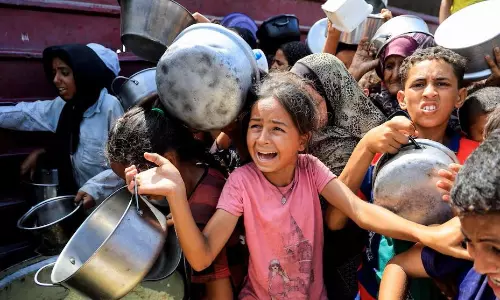 US boasts of aid affluence, aid groups refute, Palestinians call it engineered starvation