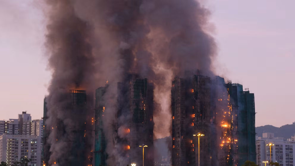 Fire sweeps Hong Kong high-rise residential complex, 13 dead