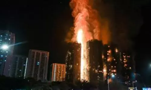 Death toll in Hong Kong residential building fire rises to 128 Death toll in Hong Kong residential building fire rises to 128