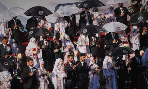 UAE holds weddings for 54 couples in Gaza