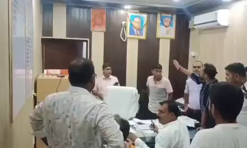 BJP worker receives heros welcome after bail in Dalit officer assault case BJP worker receives heros welcome after bail in Dalit officer assault case
