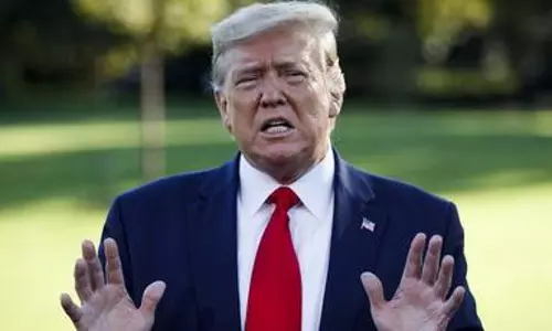 At least 16 Epstein-related files vanish from Justice Department site, including Trump’s photo