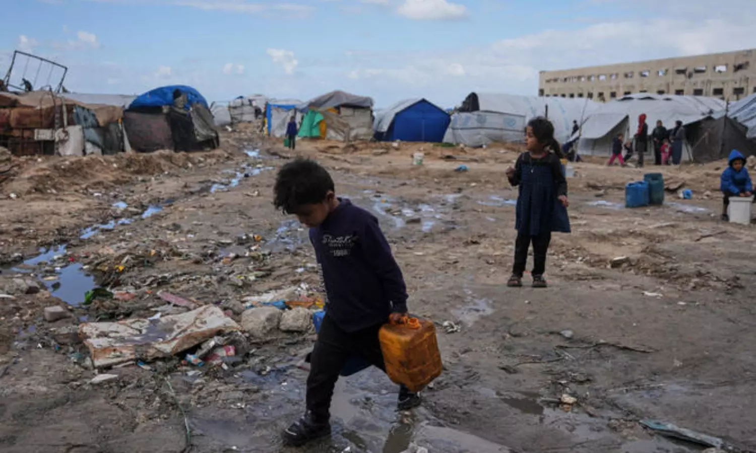 Freezing rain floods Gaza camps as aid falls short for displaced families