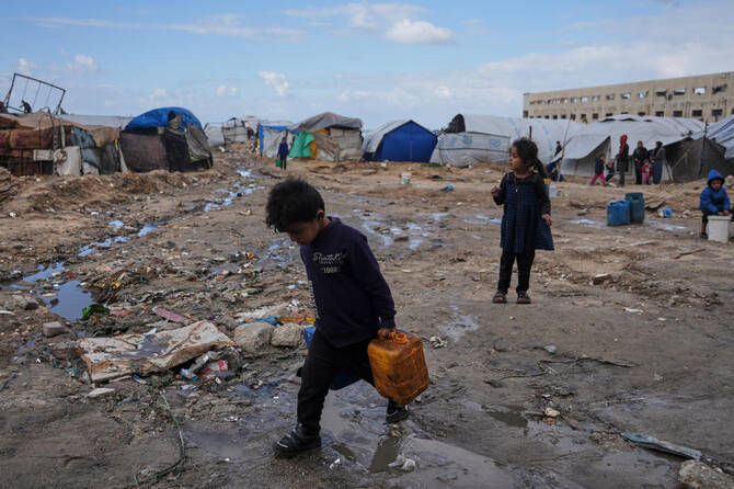 Freezing rain floods Gaza camps as aid falls short for displaced families