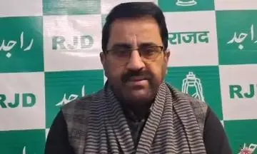 RJD condemns Bihar jewellers decision to restrict entry of customers with covered faces RJD condemns Bihar jewellers decision to restrict entry of customers with covered faces