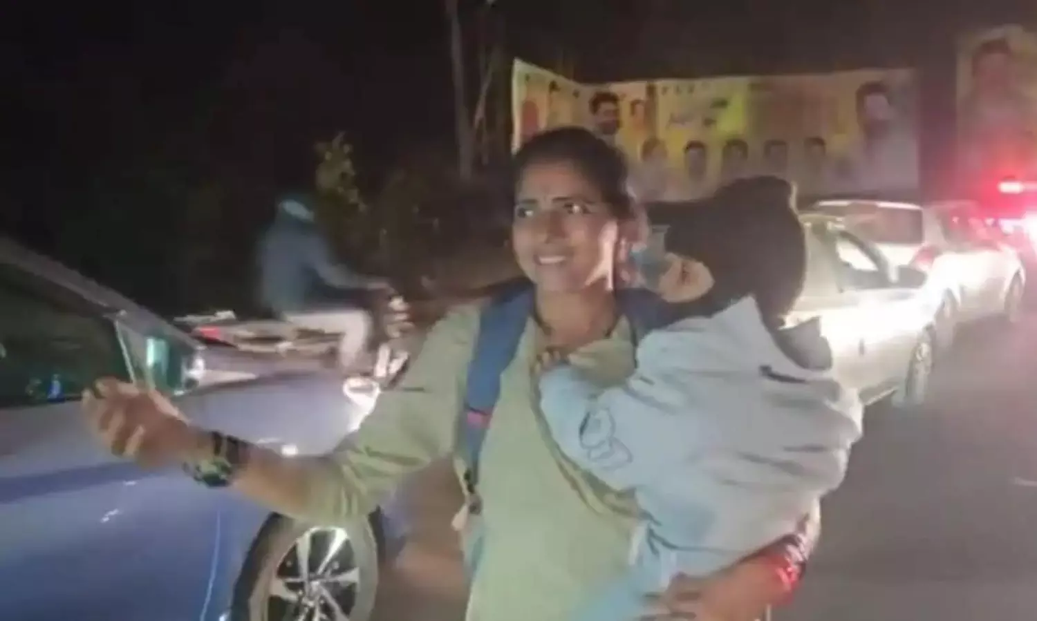 Andhra woman cop manages traffic jam holding baby in arms