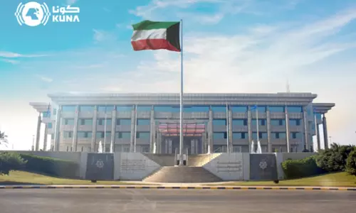 Kuwait national flag flying in front of the Ministry of Interior building in Kuwait City Kuwait national flag flying in front of the Ministry of Interior building in Kuwait City