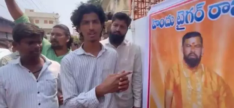 Telangana Muslim man forced to wash Raja Singh’s poster after sharing his photo with pig Telangana Muslim man forced to wash Raja Singh’s poster after sharing his photo with pig