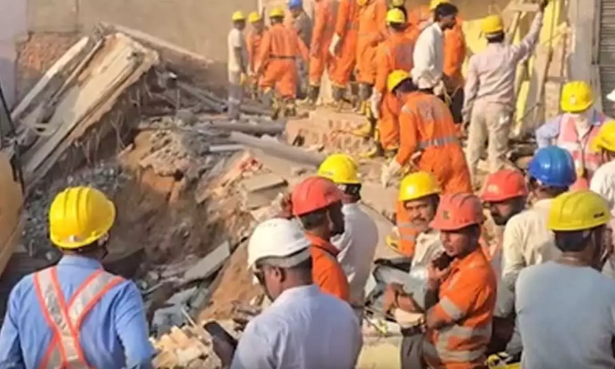 3 killed as four-storey building collapses in MP, several feared trapped 3 killed as four-storey building collapses in MP, several feared trapped