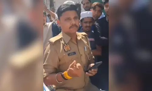 UP cop enters mosque wearing shoes during prayers, cuts loudspeaker wire UP cop enters mosque wearing shoes during prayers, cuts loudspeaker wire
