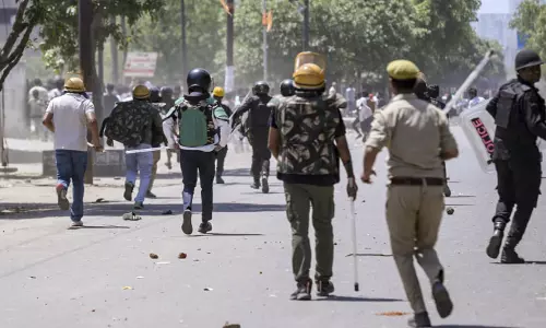 Factory workers wage protest turns violent in Noida, traffic paralysed