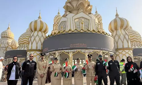 Dubai Police brings UAE flag campaign for Global Village visitors