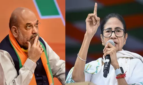 Mamata warns Amit Shah of legal action for ‘hung upside down’ remark