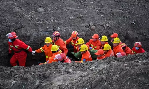 Massive coal mine blast in China kills 82; 9 trapped