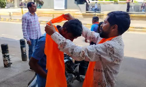 Hijab ban repeal: Hindutva group distributes saffron shawls in colleges Hijab ban repeal: Hindutva group distributes saffron shawls in colleges