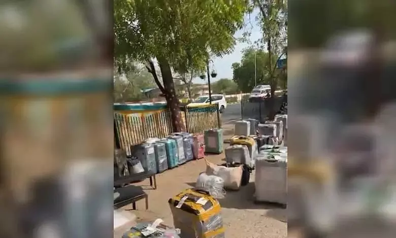 Dozens of Haj pilgrims say 126 bags went missing on arrival; luggage later found dumped roadside in Ahmedabad Dozens of Haj pilgrims say 126 bags went missing on arrival; luggage later found dumped roadside in Ahmedabad