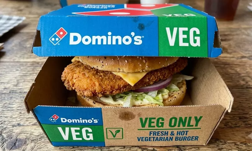 Chicken burger in veg order: Domino’s fined Rs 25,897 Chicken burger in veg order: Domino’s fined Rs 25,897