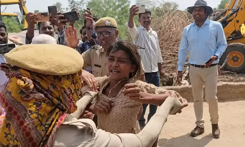 Bulldozer raj in BJP-ruled Rajasthan: Police drag tribal woman