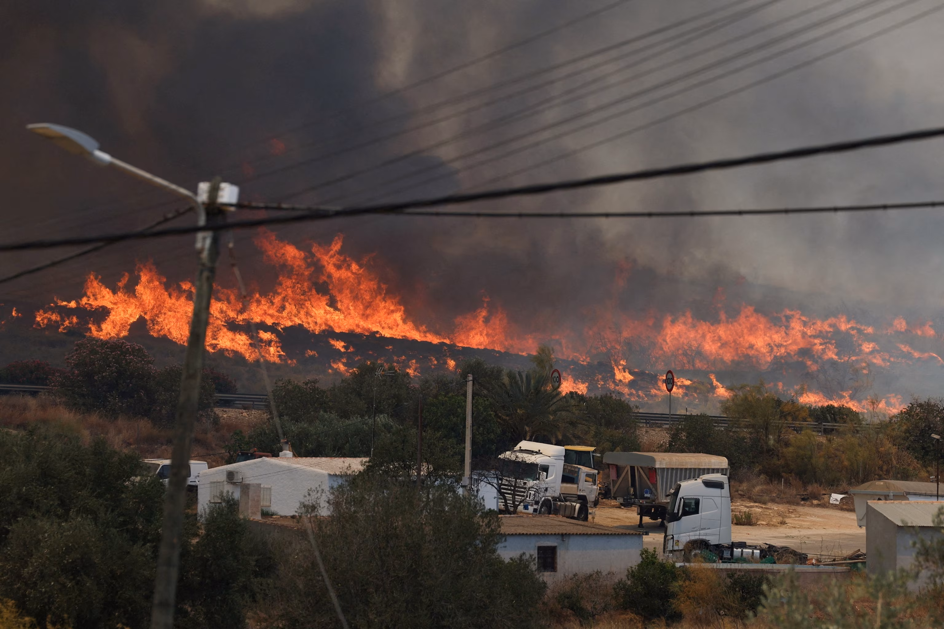 At least 12 killed as Spain battles one of its deadliest wildfires