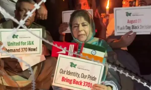 Mehbooba Mufti holds Tricolour upside down during protest, sparks row