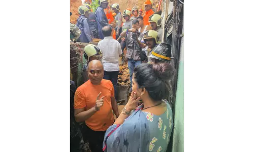 Two killed and several trapped following tragic landslide in Mumbai suburb Two killed and several trapped following tragic landslide in Mumbai suburb