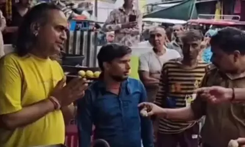 Shop owner refuses to eat food from his own shop during raid Shop owner refuses to eat food from his own shop during raid
