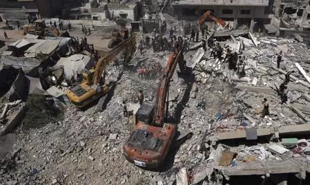 Building collapse in western Gaza kills 21, including 11 children Building collapse in western Gaza kills 21, including 11 children