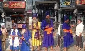 Nihang opposes halal chicken sale at Punjab shop, demands action Nihang opposes halal chicken sale at Punjab shop, demands action