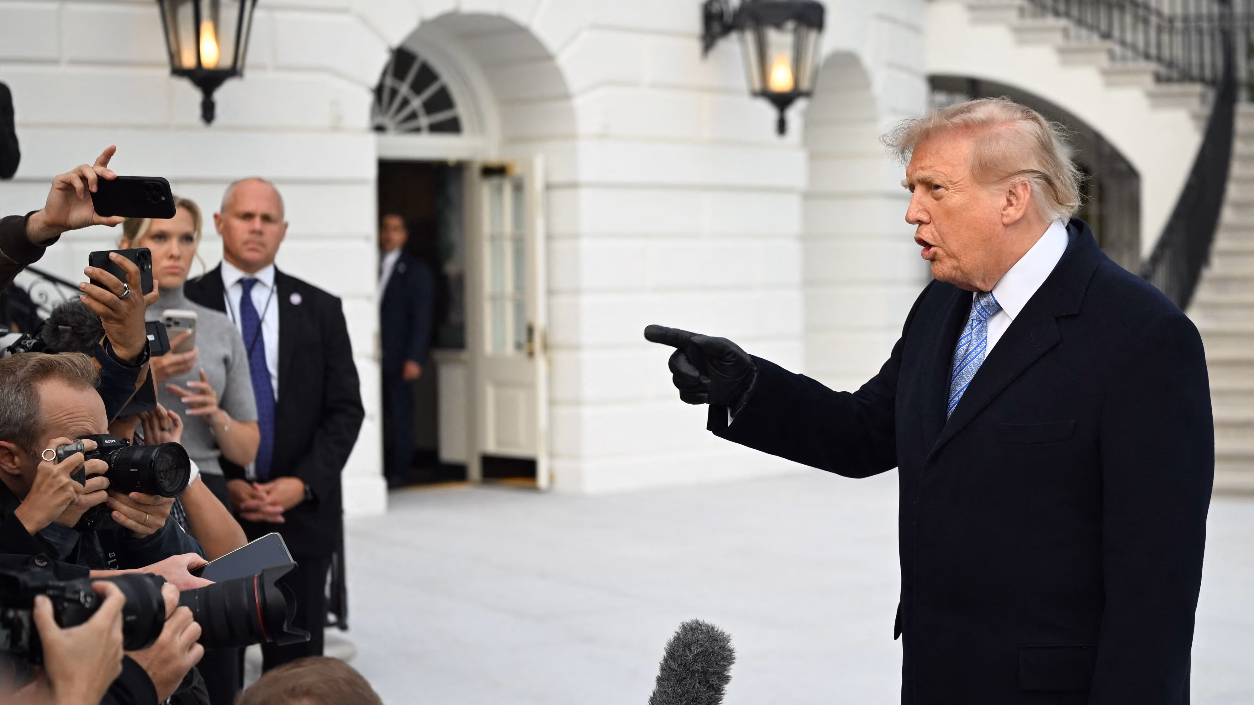 US judge blocks Trump’s White House media ban, orders access restored